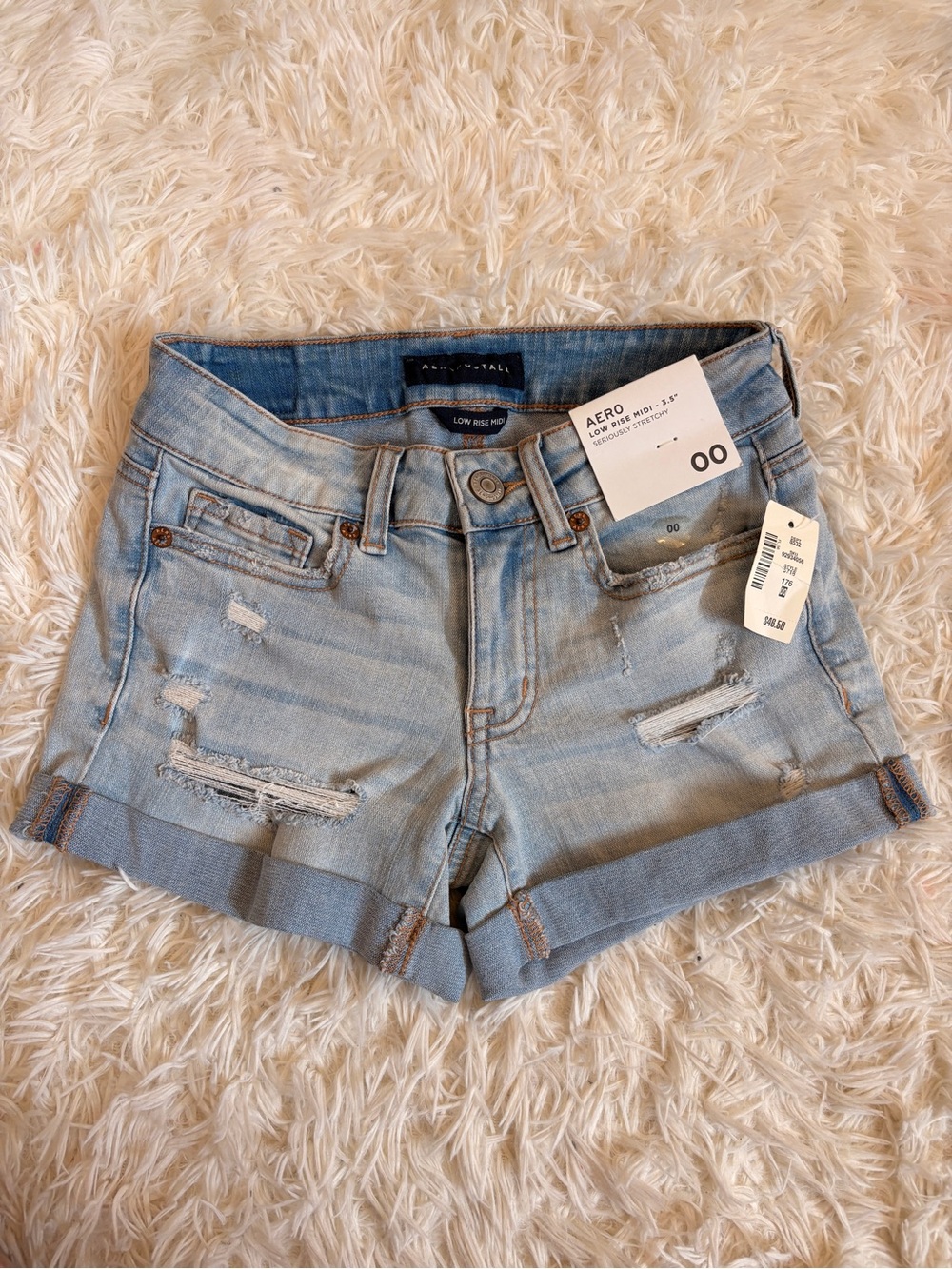 Aero Light Wash Distressed Denim Shorts - 00